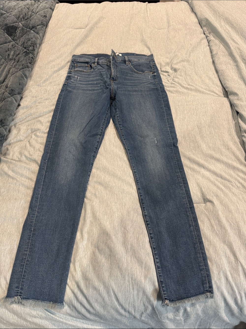 LOFT size 30 Women’s Slim Straight Jeans in Dark Blue with fringe bottom